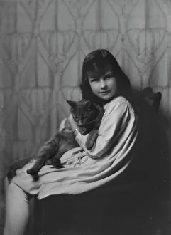 Daughter of Mrs. H Gamble, with cat, portrait photograph, 1917 Nov. 23. Creator: Arnold Genthe
