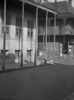 Corner Shop Prints: Dauphine Street, New Orleans, between 1920 and 1926. Creator: Arnold Genthe