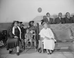 Deacons corner in the Church of God in Christ, Washington, D. C. 1942. Creator: Gordon Parks
