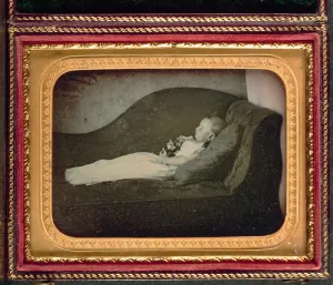 Unidentified Photographer Prints: Dead Child On a Sofa, c. 1855. Creator: Unidentified Photographer