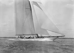 Adam Mortimer Singer Gallery: Deck of the 23-metre cutter Astra sailing close-hauled, 1933. Creator: Kirk & Sons of Cowes