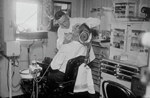 Treating Prints: Dentist on COMFORT, between c1915 and c1920. Creator: Bain News Service