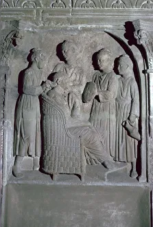 Depiction of Roman womens hair dressing on an altar Depiction of Roman womens hair dressing on an altar