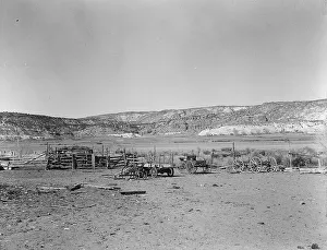 Wagons Prints: Desert mountains surround Escalante, Utah, 1936. Creator: Dorothea Lange