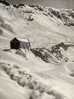 Cecil J Allen Collection: Devastated. - Over sixty yards of snow-shedding destroyed by an avalanche in 1921, 1935