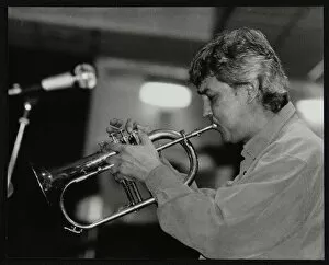 Dick Gallery: Dick Pearce playing the flugelhorn at The Fairway, Welwyn Garden City, Hertfordshire, 1999