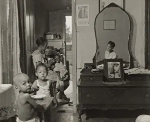 Charlady Gallery: Dinner time at the home of Mrs. Ella Watson, a government charwoman, Washington, D.C. 1942