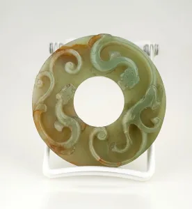 Disc Prints: Disc with two animals in relief. Creator: Unknown