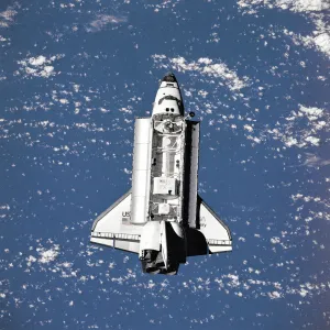 Space Shuttle Collection: Discovery seen from Mir, 1998. Creator: NASA