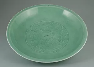 Celadon Gallery: Dish with Dragon amid Clouds and Lotus Petals, Qing dynasty (1644-1911). Creator: Unknown