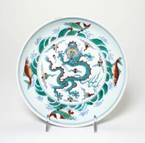 Underglaze Blue Gallery: Dish with Dragon amid Flames Encircled by Fish amid Waves, Qing dynasty