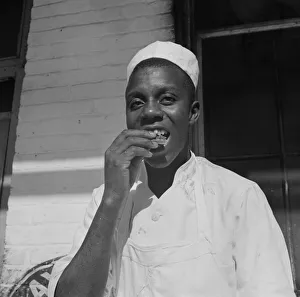 A dishwasher who works in a waterfront restaurant, Washington, D. C. 1942. Creator: Gordon Parks
