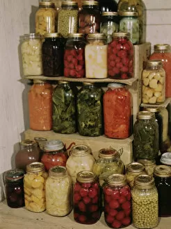 World War Two Gallery: Display of home-canned food, between 1941 and 1945. Creator: Unknown