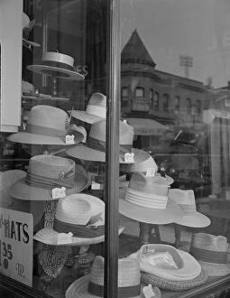 Straw Hat Collection: Display window at 7th Street and Florida Avenue, N.W. Washington, D.C. 1942. Creator: Gordon Parks