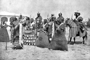 Cameroon Prints: Distant Fronts, In Cameroon; Escort of the lamido of Rey Bouba... 191 Creator: Unknown