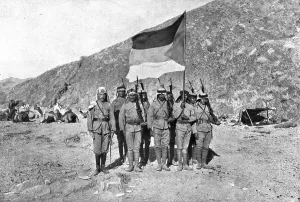 Independent Prints: Distant Fronts, In Hejaz; Flag of the Independent Kingdom of Hejaz, 1917. Creator: Unknown