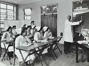 Healthcare Prints: A doctor instructs trainee midwives, 1950s. Creator: Unknown