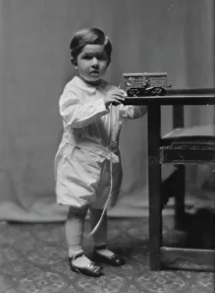 Toy Train Prints: Dodd, E.A. Mrs. child of, portrait photograph, ca. 1913. Creator: Arnold Genthe
