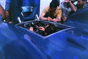 Campbell Collection: Donald Campbell in Bluebird CN7 cockpit at Lake Eyre 1963, Ken Norris on right. Creator: Unknown