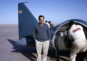 Donald Campbell in front of Bluebird CN7, Lake Eyre, Australia, 1964. Creator: Unknown