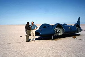 Donald Campbell being interviewed in front of Bluebird CN7, Lake Eyre, Australia, 1964