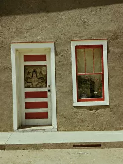 Door Collection: Door and window in a Spanish-American home, Costilla, New Mexico, 1940. Creator: Russell Lee