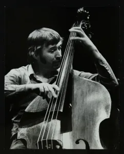 Double bassist Ron Mathewson playing at the Forum Theatre, Hatfield, Hertfordshire, 23 January 1982