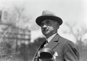 Dr. Maximilian Toch, standing outdoors, 1936. Creator: Arnold Genthe