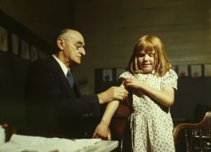 Vachon John Gallery: Dr. Schreiber of San Augustine giving a typhoid innoculation... San Augustine County, Texas, 1943