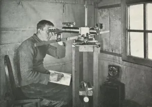 Meteorologist Prints: Dr. Simpson at the Unifilar Magnetometer, 1911, (1913). Artist: Herbert Ponting