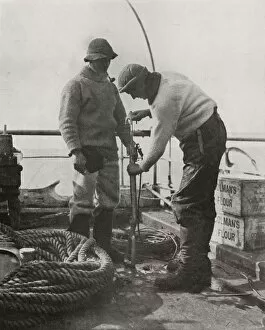 Dr. Wilson and Dr. Atkinson Loading The Harpoon Gun, c1910–1913, (1913)