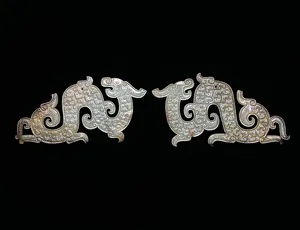 Dragon Pendants, Eastern Zhou dynasty, Warring States period, c. 4th/3rd century B.C Dragon Pendants, Eastern Zhou dynasty, Warring States period, c. 4th/3rd century B.C