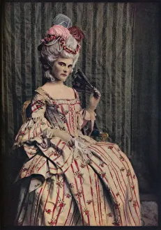 A dress of charming proportion in beautiful French brocade. Period 1775-85, c1913
