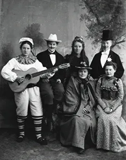 Nordic Museum Prints: Six dressed-up youngsters, one of the young people plays the guitar