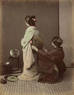 Adjusting Prints: Dressing Obi, 1870s-1890s. Creator: Kusakabe Kimbei
