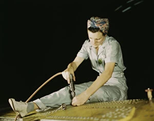 Riveter Gallery: Drilling on a Liberator Bomber, Consolidated Aircraft Corp. Fort Worth, Texas, 1942