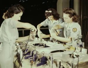 Drilling a wing bulkhead for a transport plane at the Consolidated Air... Fort Worth, Texas, 1942. Creator: Howard Hollem