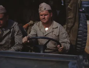 Military Base Prints: Driver of Marine truck, New River, N. C. 1942. Creator: Alfred T Palmer
