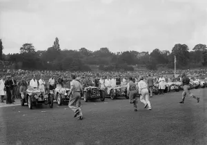 Drivers running to their cars at the start of a race at Crystal Palace, London, 1939