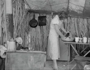 Housework Prints: Drought refugee living in a ditch bank camp