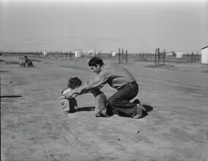 Displacement Prints: Drought refugees - penniless Oklahomans camped along highway