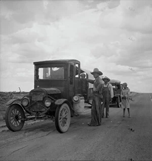 Bib Overalls Collection: Drought refugees stopped along the highway near Lordsburg, New Mexico, 1937. Creator: Dorothea Lange