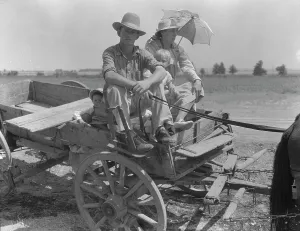 Climate Prints: Drought-stricken farmer and family near Muskogee, Oklahoma, 1939. Creator: Dorothea Lange
