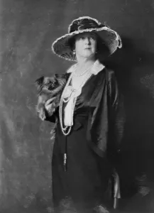 Pearl Earrings Prints: Duff-Gordon, Lady, with dog, portrait photograph, not before 1916. Creator: Arnold Genthe