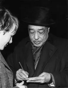 Signature Collection: Duke Ellington signing his autograph, c1962. Creator: Brian Foskett