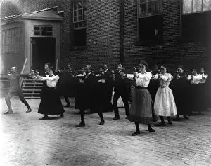Physical Education Prints: Dumbbell exercises, (1899?). Creator: Frances Benjamin Johnston