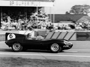 Onlookers Collection: Duncan Hamilton driving a Jaguar D type, RAC Tourist Trophy, Goodwood, Sussex, 1958
