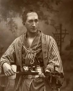 Durward Lely, Scottish opera singer, in Gilbert and Sullivan's The Mikado, 1887. A photograph from The Theatre, A Monthly Review, Volume IX, January to June, 1887, Carson & Comerford, London, 1887 Durward Lely, Scottish opera singer, in Gilbert and Sullivans The Mikado, 1887. Artist: Ernest Barraud