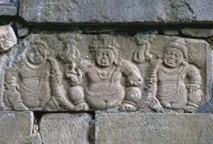 Dwarf figures on a building in the Buddhist city of Anuradhapura Dwarf figures on a building in the Buddhist city of Anuradhapura