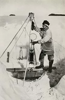 Captain Robert Falcon Collection: E. W. Nelson with the Nansen-Petersen Insulated Water-Bottle, c1911, (1913). Artist